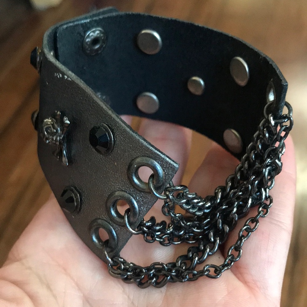 Reversible gunmetal skulls cuff bracelet